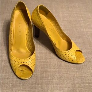 Celine yellow peep toe pumps